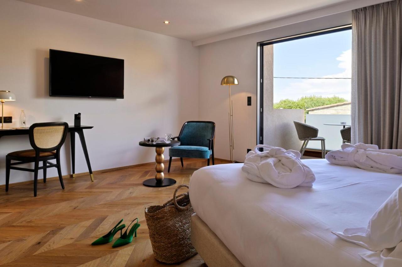 & Rocabella Hotel